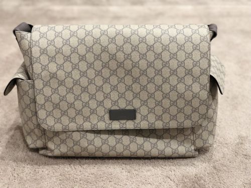Authentic Leather Gucci Diaper Bag. Great condition. Comes with a changing pad.