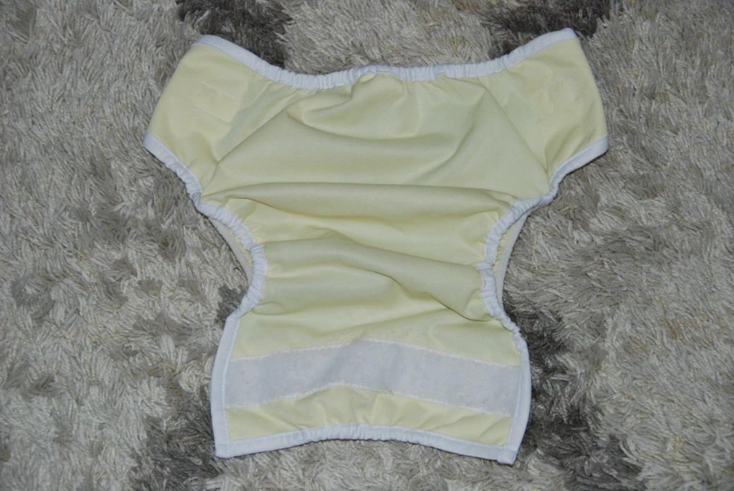 Thirsties size medium cloth diaper cover light yellow hook loop made in USA