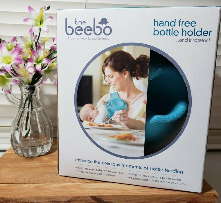 New The Beebo Hands Free Bottle Holder (Teal) Rotates Baby