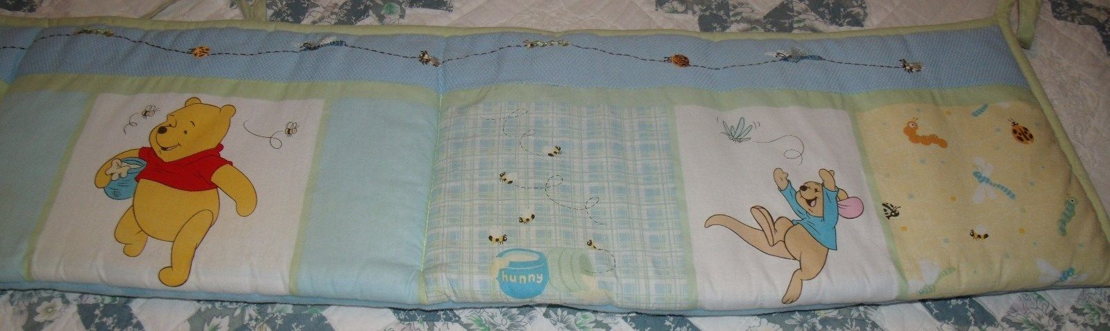 winnie the pooh reversible crib bumper pad pooh and friends with garden bugs