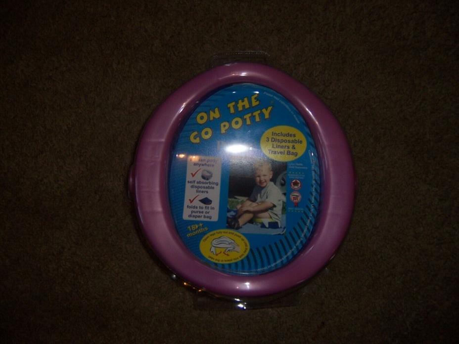 ON the Go Potty with 2  Liners and Travel Bag New PINK