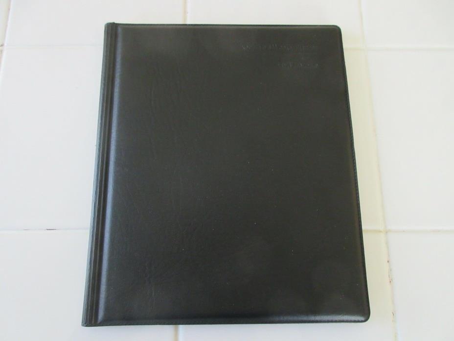 Address Book enclosed in Black Vinyl Folder.  9”x7.5”