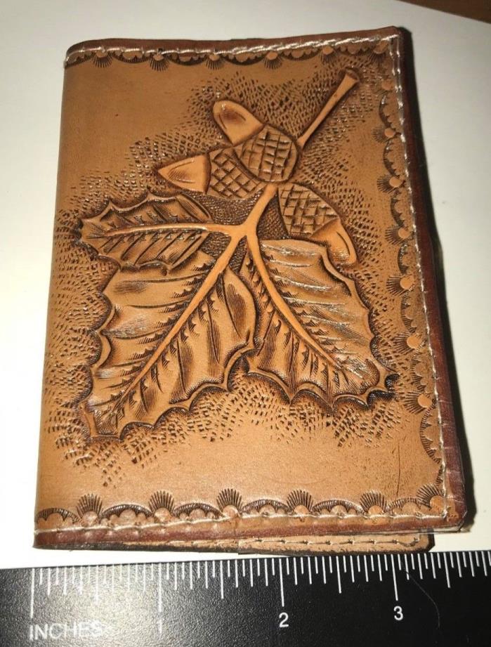 Hand tooled leather note book . Uses standard size refills, 3.25 x 4.5
