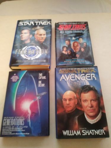 4 Star Trek Books. Hardcovers w/ Dust covers