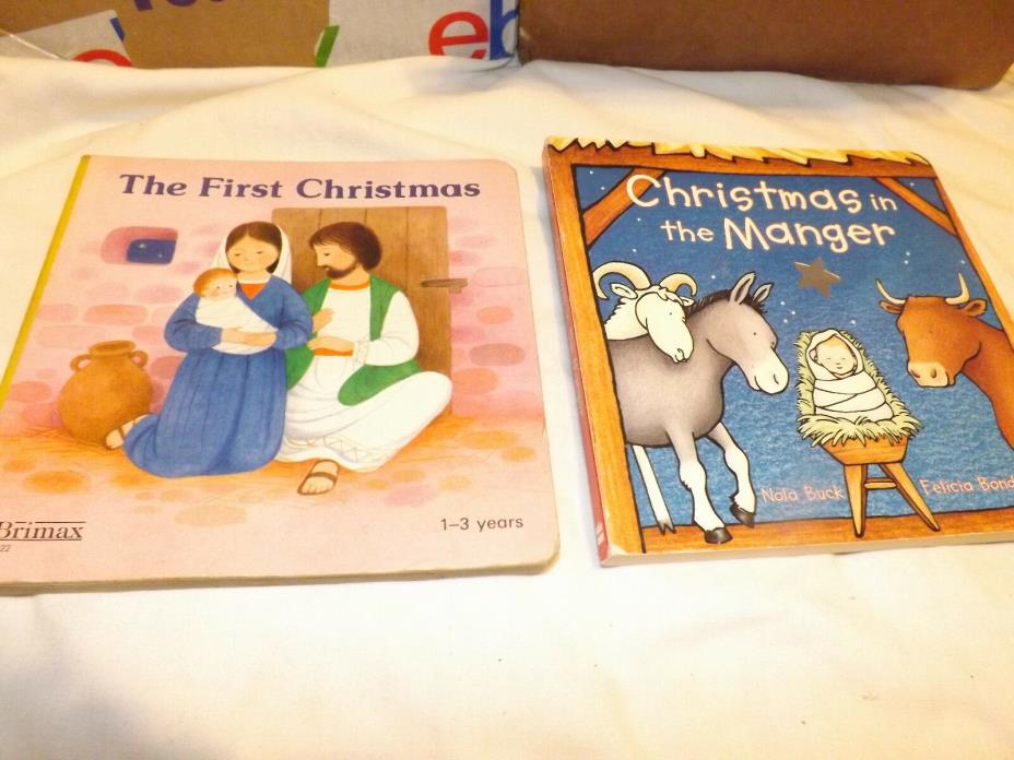 Nativity pair: The First Christmas + Christmas in the Manger; two cardboard kids