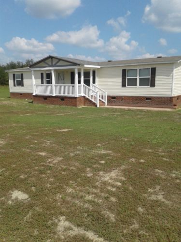 Mobile home with land 7.33 acres and work shop