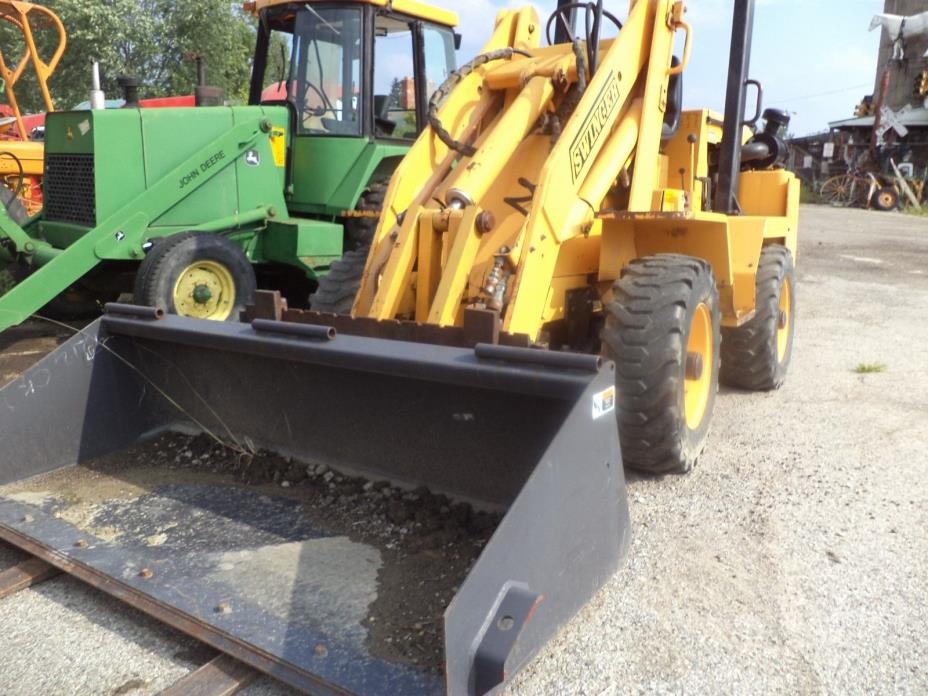 SWINGER  WHEEL LOADER JOHN DEER DIESEL all wheel steering , 4x4.forks,new bucket