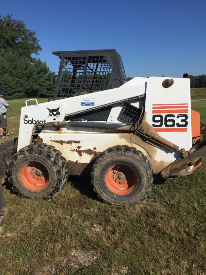 For Sale a 963 Bobcat, with a seven and a half foot bucket, scarfire, and forks.