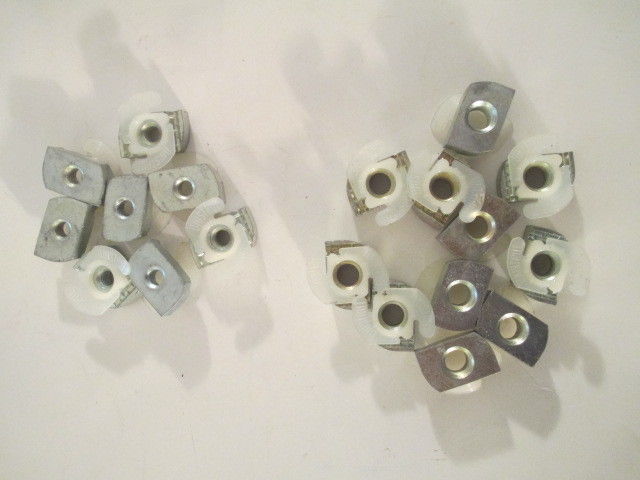 Unistrut  8 each 3/8 in. and 11 each 1/2 in.  Clamping Nut  Rigid  Steel.