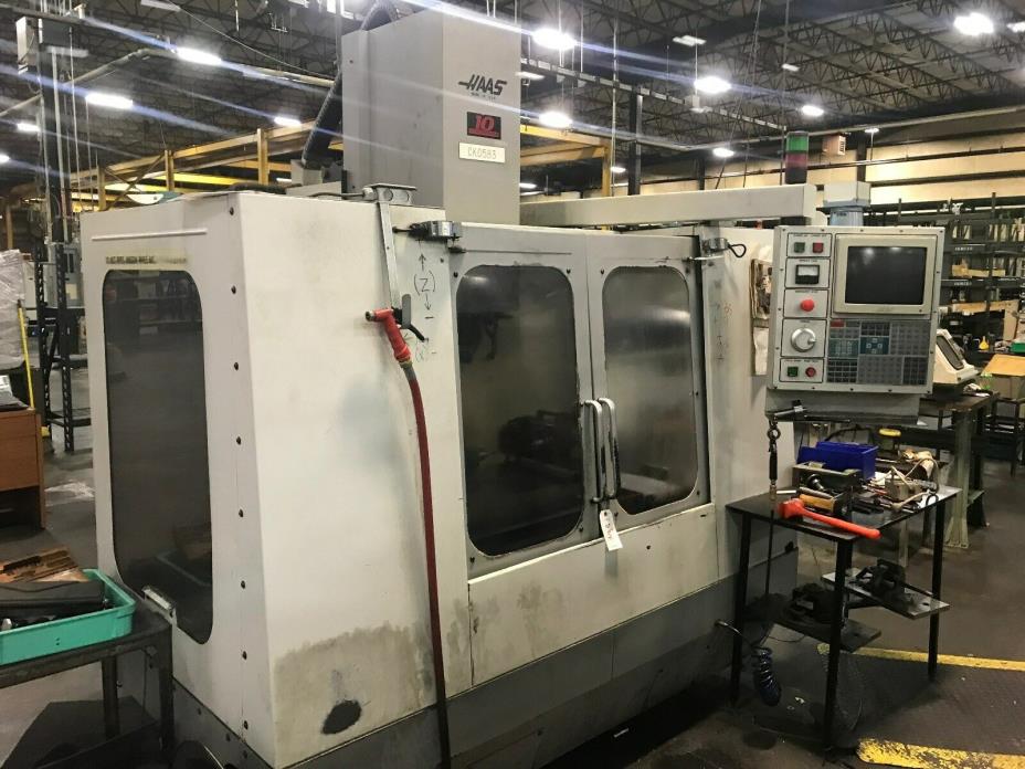 HAAS VF-0 CNC VMC With Tool Changer 4th Axis Chip Auger and CAT 40 Tooling  1995