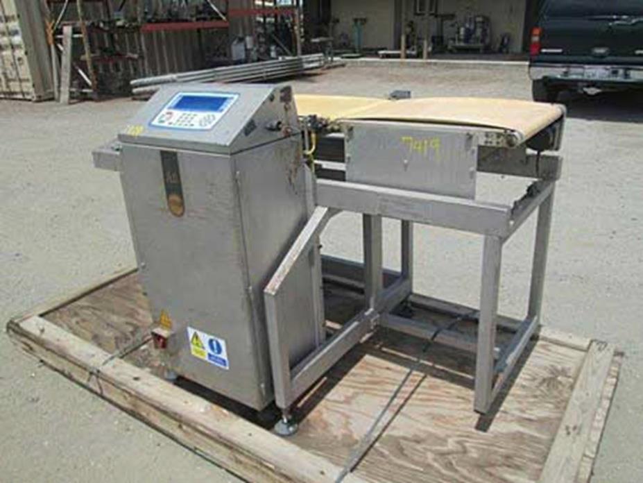 Loma check weigher 4.4 to 11 pounds, 16 in belt reject
