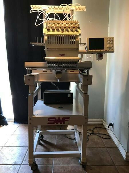SWF 15-needle Embroidery Machine With Hoops and Supplies. SWF/ E-T1501-C