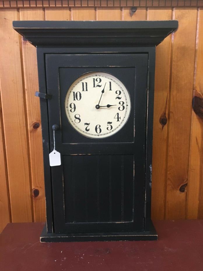 Antiqued Black wall clock with built in shelving 25