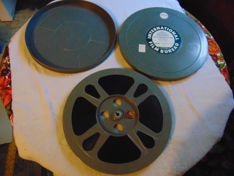 Vintage 16MM  PLASTIC 12 inch Reel with film and Plastic canister Lot M
