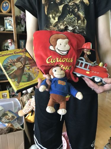 Lot of 4 Curious George Items Plush, Pillow, DVD, And Toy Fire Engine