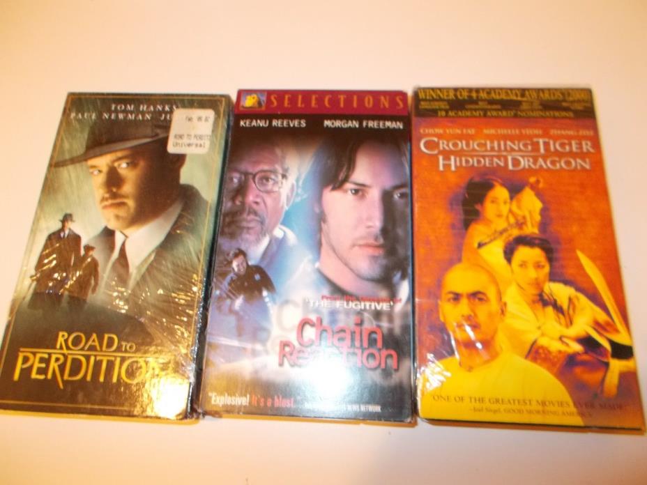 Road to perdition ,chain reaction,Crouching Tiger Hidden Dragon  VHS Tapes