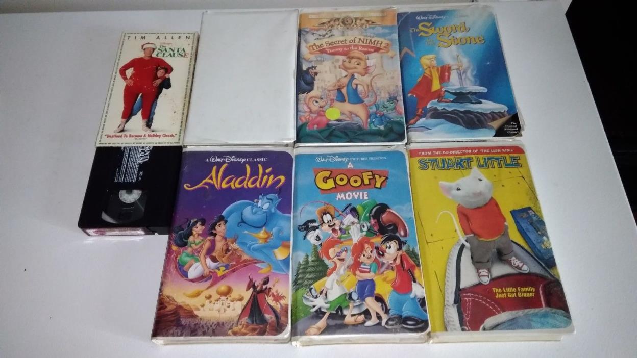 7 disney vhs movie lot Aladdin jungle book goofy movie sword stone santa tapes