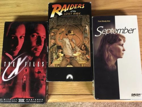 3 Title VHS Lot! Something For Everyone! Raiders Lost Ark, X Files