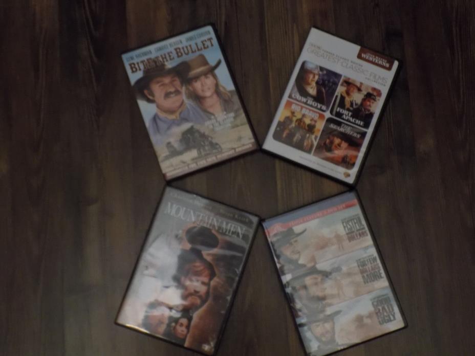 Four Cowboy DVD's, 9 total movies, 4 John Wayne Movies, 3 Clint Eastwood Movies