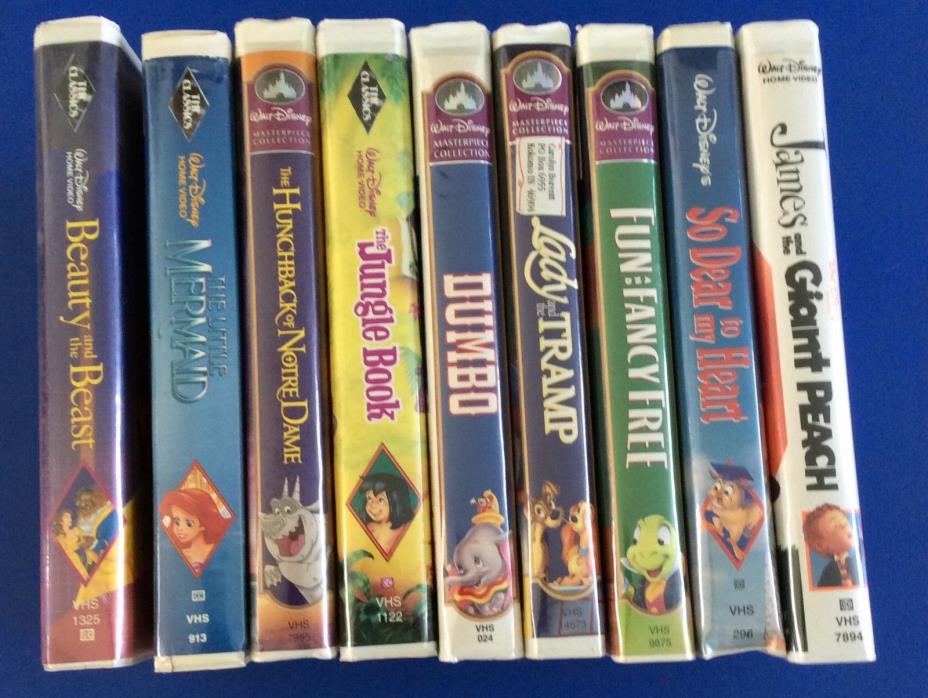 Set of 9 Disney VHS Movies in clam Shells