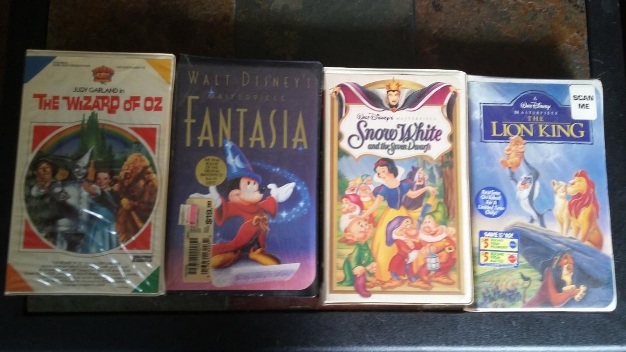 LOT OF 4  MOVIES DISNEY AND MGM WIZARD OF OZ (VHS)