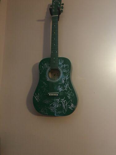 AUTOGRAPHED GUITAR WITH LOTS OF SIGNATURES FROM COUNTRY ARTISTS