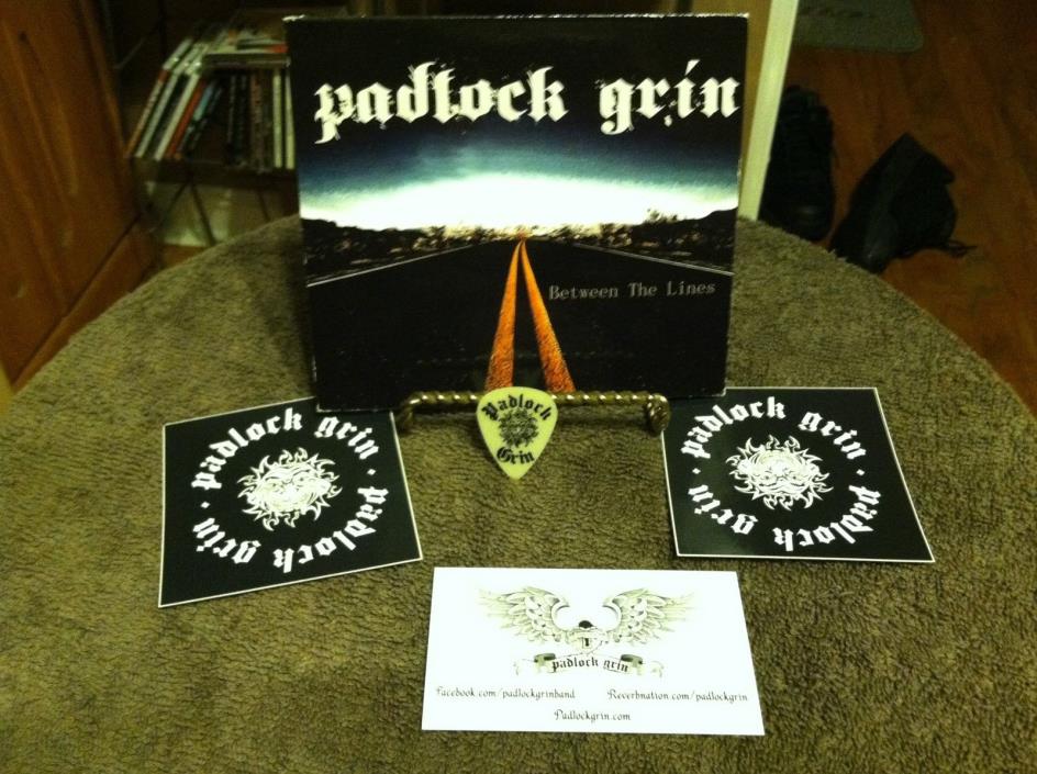 Padlock Grin CD Between The Lines w/guitar pick and stickers 