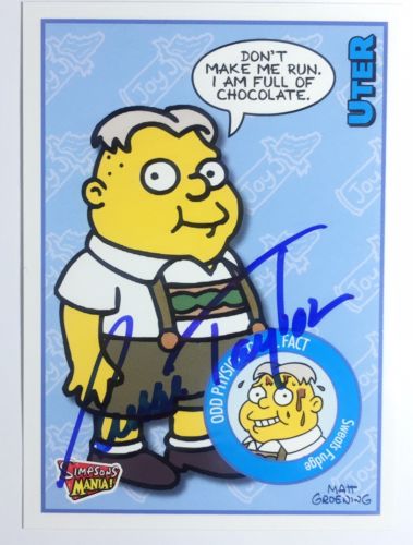 RUSSI TAYLOR SIGNED SIMPSONS UTER CARD, COA & MYSTERY GIFT’