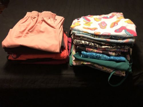 Huge Lot of Women’s Scrubs.  Sizes Small And Xtra Small.