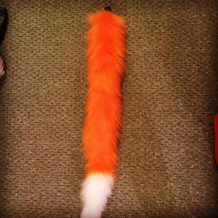 fursuit orange and white cat tail
