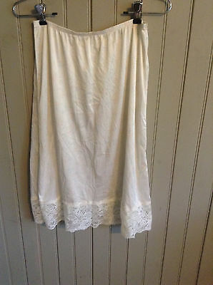 Vintage small white 1/2 slip with lace hem