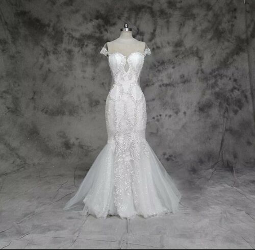 Never worn Illusion Lace Wedding Dress with Detachable Skirt