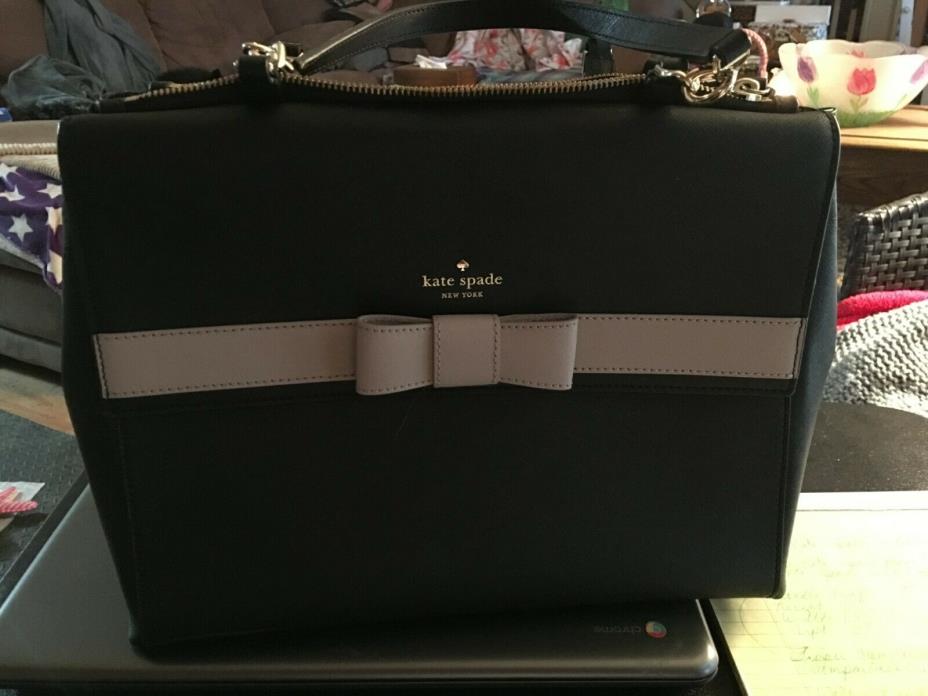 Large black Kate Spade bag with bow front and gold hardware