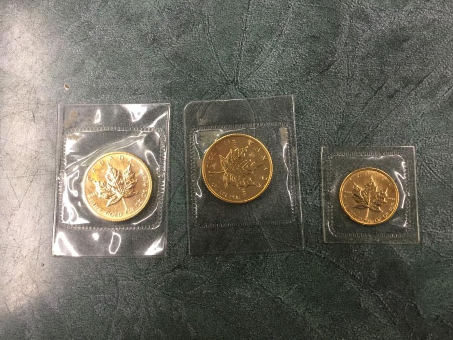 2 x Canada 1/4 oz Gold Maple Leaf 1 x 1/10 oz Gold Maple Leaf