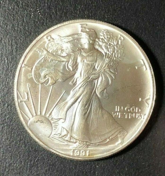 1991 AMERICAN SILVER DOLLAR EAGLE ~ GEM BU CONTAINS 1 TROY OZ .999 FINE SILVER