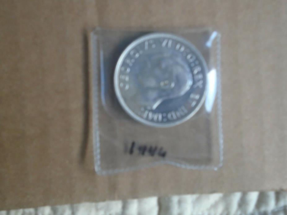 up is a nice graded coin PL-65 year 1964