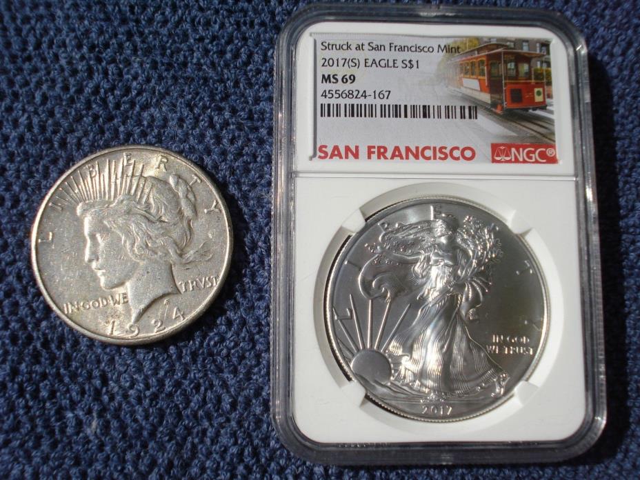TWO SILVER COINS:1924 S PEACE DOLLAR + 2017 SAN FRANCISCO TROLLEY AMERICAN EAGLE