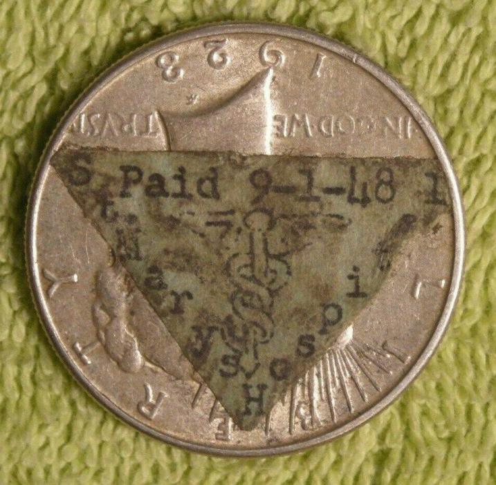 St. Mary's Hospital sticker dollar on 1923 Peace dollar paid 9-1-48