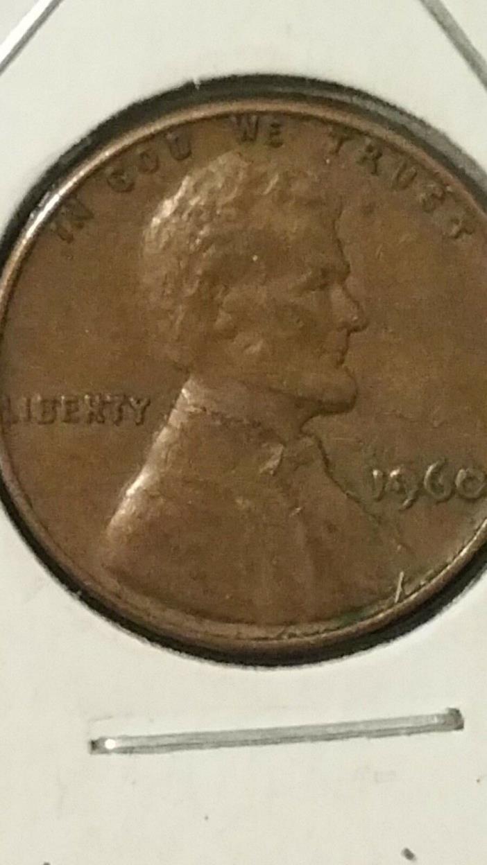 1960 P LINCOLN MEMORIAL CENT HAS A LAMINATION PEEL