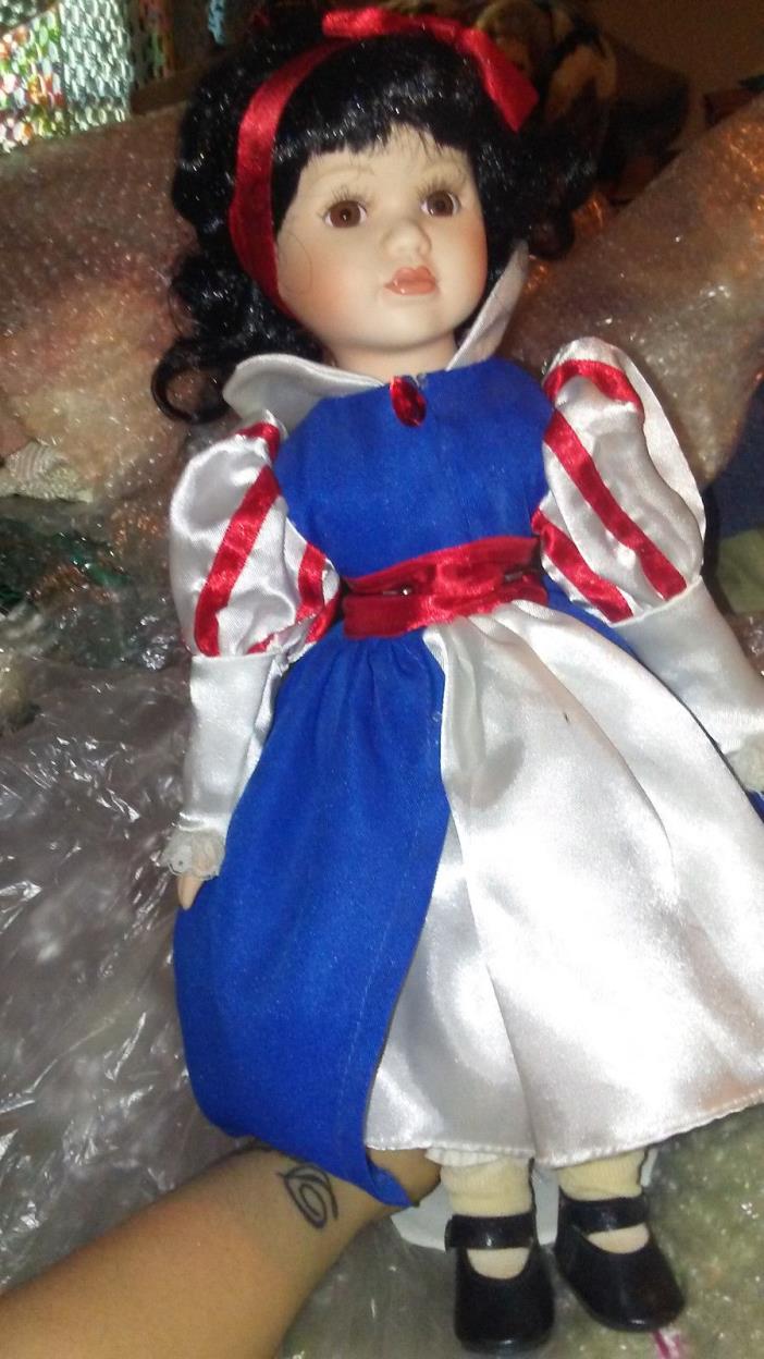 porcelain snow white 16 inch doll with stand great condition