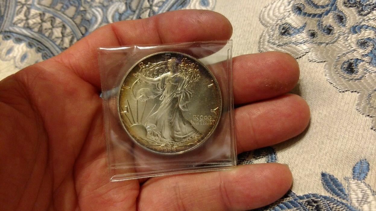 1988 American Silver Eagle One Dollar Coin with Stunning Rainbow Toning