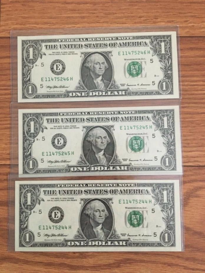 3 uncirculated dollar bills