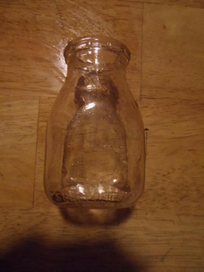 VINTAGE/ANTIQUE HALF-PINT MILK BOTTLE-ELK COUNTY DAIRY, ST. MARY'S ,PA.wore off