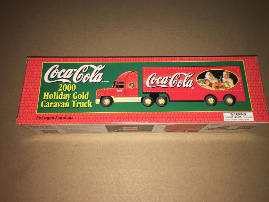 Coca Cola 2000 Holiday Gold Caravan Truck NIB