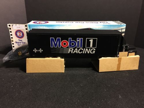 MOBIL RACE CAR CARRIER LIMITED EDITION BLACK HEAD,TAIL RUNNING LIGHTS 1/64