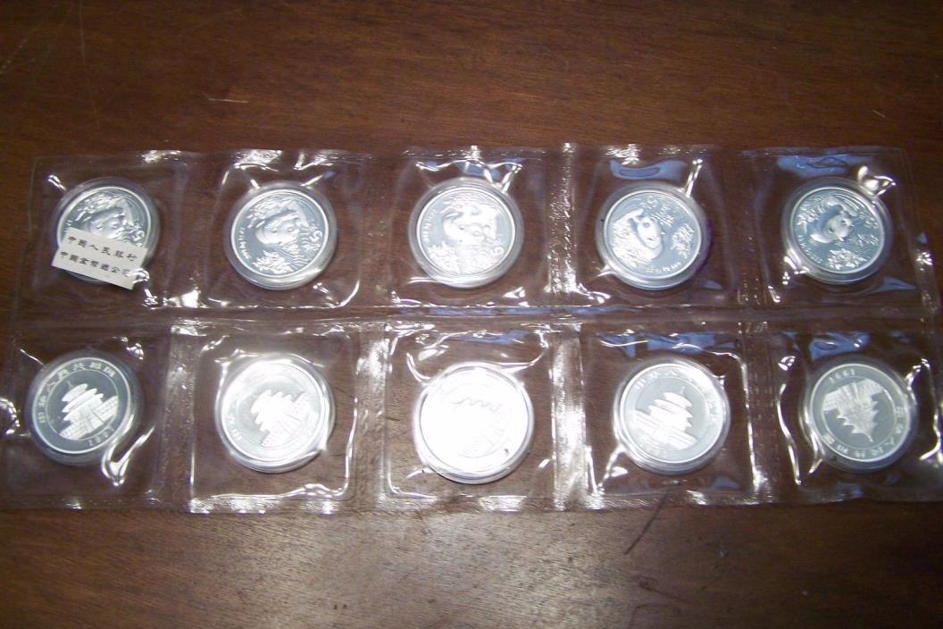 1997 China S5Y 1/2oz .999 Silver Pandas  Doubled sealed Sheet of 10 Panda coins