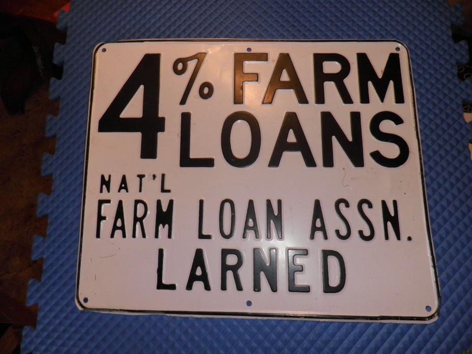 National Farm Loan Assn. embossed tin sign Larned Kansas