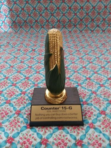 Vintage Counter 15 - G Soil Insectiside heavy cast metal Corn Trophy