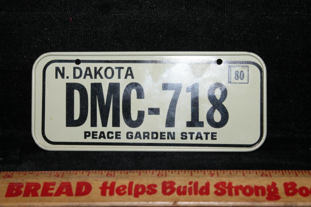 Vintage 1980 N. North Dakota Cereal Mini Bike License Plate #DMC-718 Peace