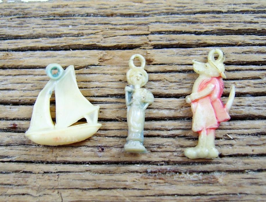 Set of THREE Vintage Celluloid Charms: Lady, Dog in Coat, Sailboat  Two-JAPAN